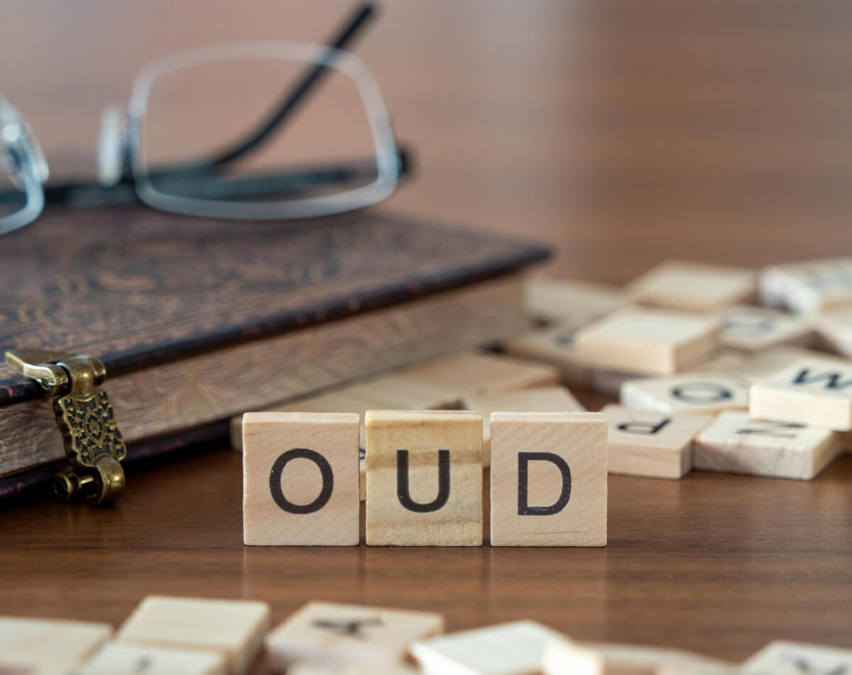 oud represented by wooden letter tiles