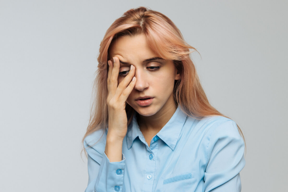 woman showing signs of drowsiness